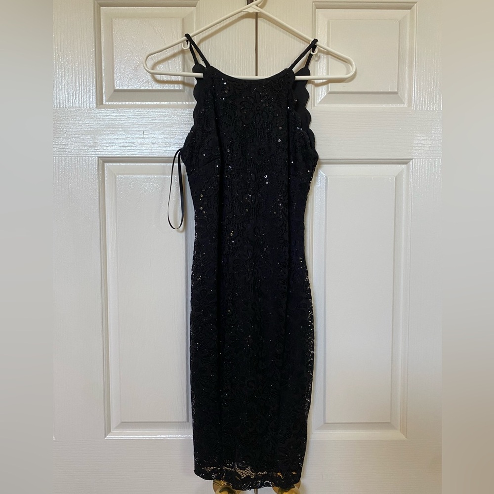 Pretty black shiny dress!! Worn once, tailored small shoulder straps.